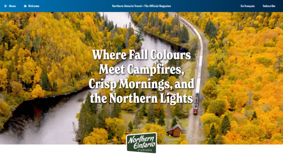 Northern Ontario travel website hero with autumn forest, road, and headline about fall colors and campfires