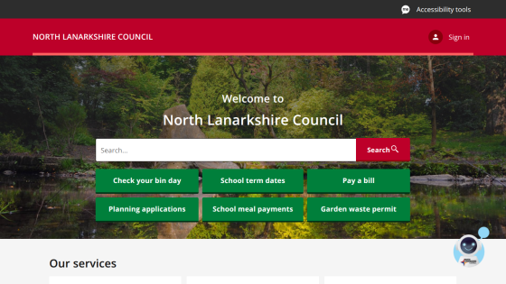North Lanarkshire Council homepage with search bar and quick links for bin day, school dates, bills, planning, meals, and permits