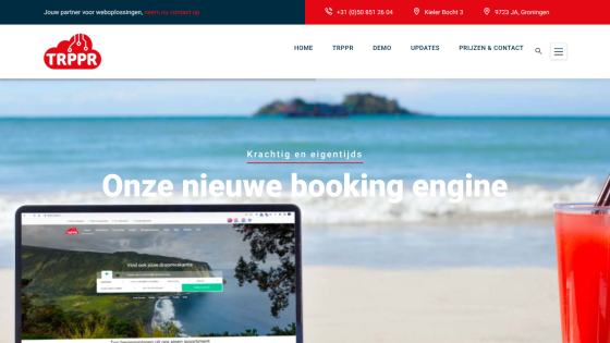 Website showcasing a new booking engine with a beach background and a laptop display.