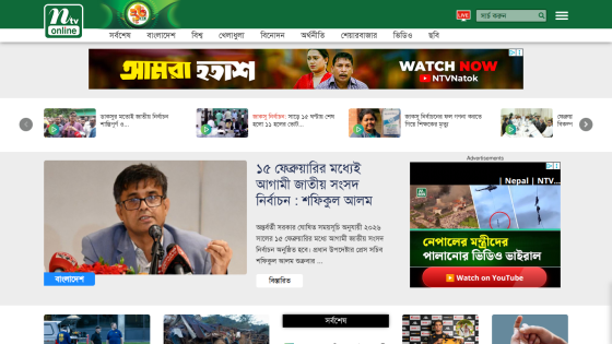 News website featuring articles and a video player in the top section.