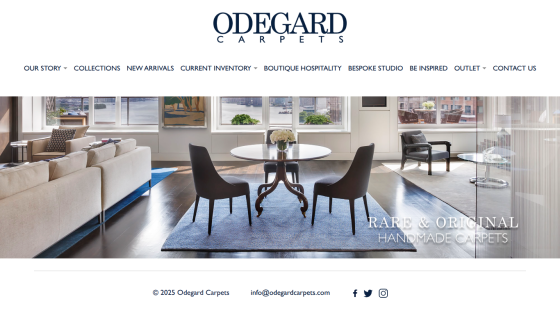 Odegard Carpets website with navigation menu and hero image of a modern living room featuring handmade carpets