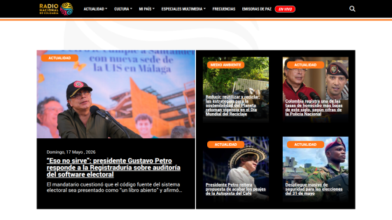 News website featuring a press conference with a speaker and various news articles.