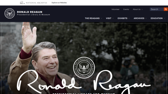 Ronald Reagan Presidential Library homepage featuring a smiling Reagan waving, with navigation options above.