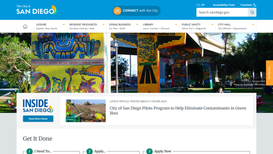 City of San Diego homepage featuring colorful murals and links to city services.