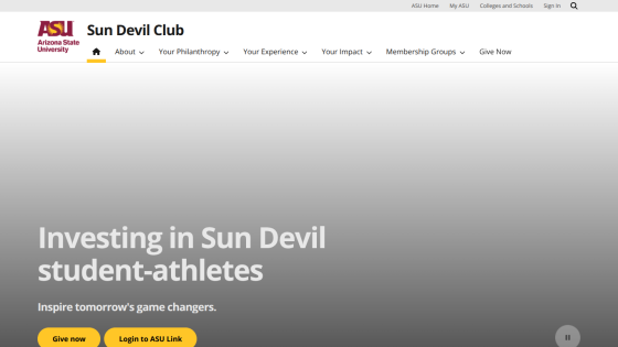 Homepage with navigation bar, large hero image featuring a mountain landscape, and headline 'Explore the World with Us'