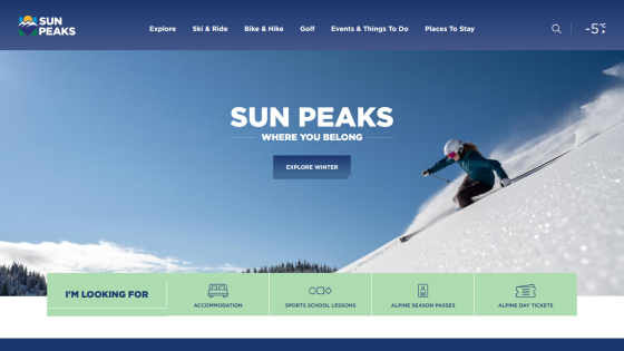 Ski resort homepage with navigation bar, snow-covered mountain background, and call-to-action button