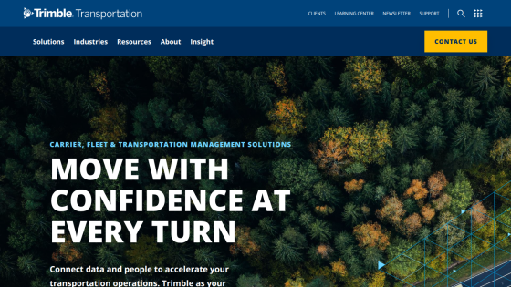 Transportation management solutions website with headline 'Move with confidence at every turn' and navigation links
