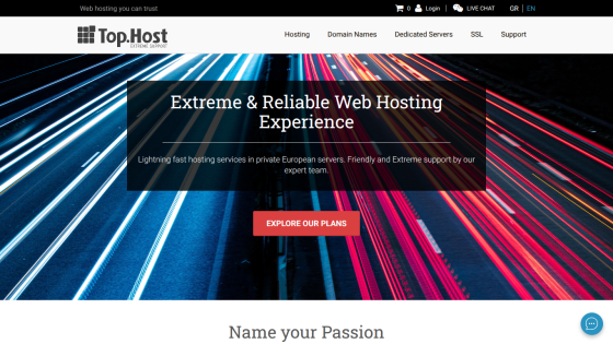 Top.Host web hosting homepage with headline Extreme & Reliable Web Hosting Experience and a call-to-action button to explore plans