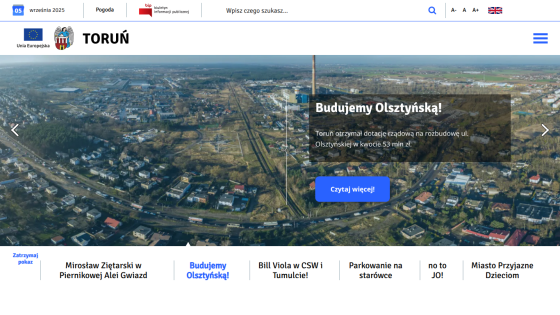 Homepage of Toruń with a panoramic view and a call to action for a local initiative.