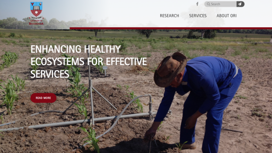 Website promoting healthy ecosystems with a person working in a field.