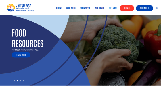 Homepage with navigation bar, large hero image featuring a mountain landscape, and headline 'Explore the World with Us'