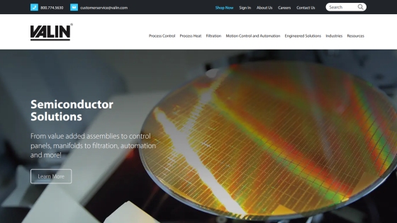 Valin website header with contact info and navigation