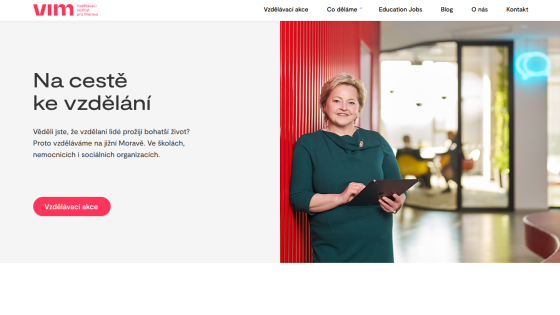 Educational institute promoting learning in South Moravia with a woman holding a tablet and a call-to-action button