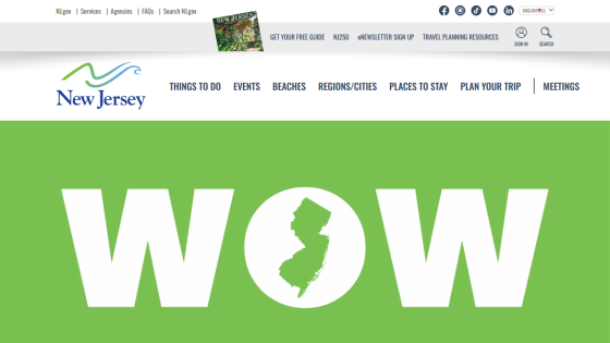 New Jersey tourism website featuring a bold 'WOW' headline and state outline on a green background.
