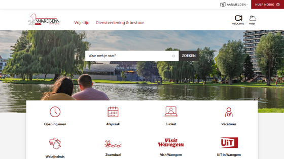 City of Waregem website with search bar, navigation links, and icons for services like opening hours, appointments, and swimming pool
