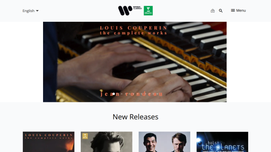 Warner Classics website header with language selector and new classical music releases including Louis Couperin and Holst albums