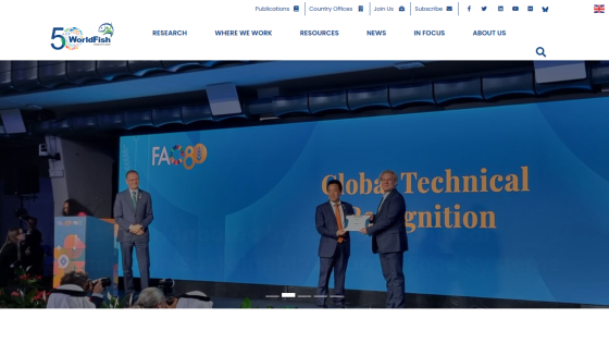 WorldFish website celebrating 50 years with a hero image of three men in a boat on a lake and headline about Africa's aquaculture sector