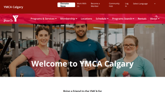 YMCA Calgary homepage with navigation menu and welcome message over gym background featuring three people in workout attire.