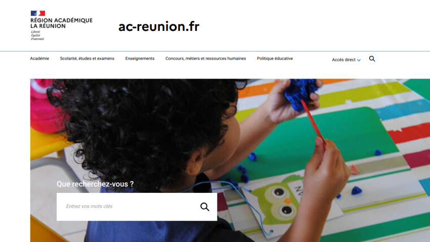 Homepage of ac-reunion.fr featuring a child engaged in an art activity with a search bar.