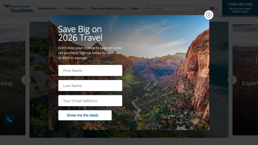 Amtrak Vacations homepage with a scenic waterfall background promoting America on sale with up to $600 off and a search bar for destinations and trips