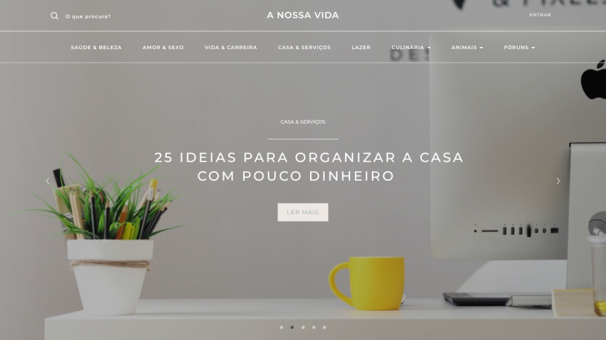 Homepage featuring tips for organizing a home on a budget with a yellow cup and plant in view.