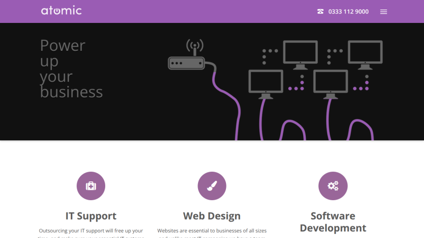 Atomic website header with contact number and hero section promoting business IT support, web design, and software development services