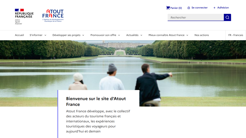 Welcome message for the About France website with scenic background and three people looking at a landscape.