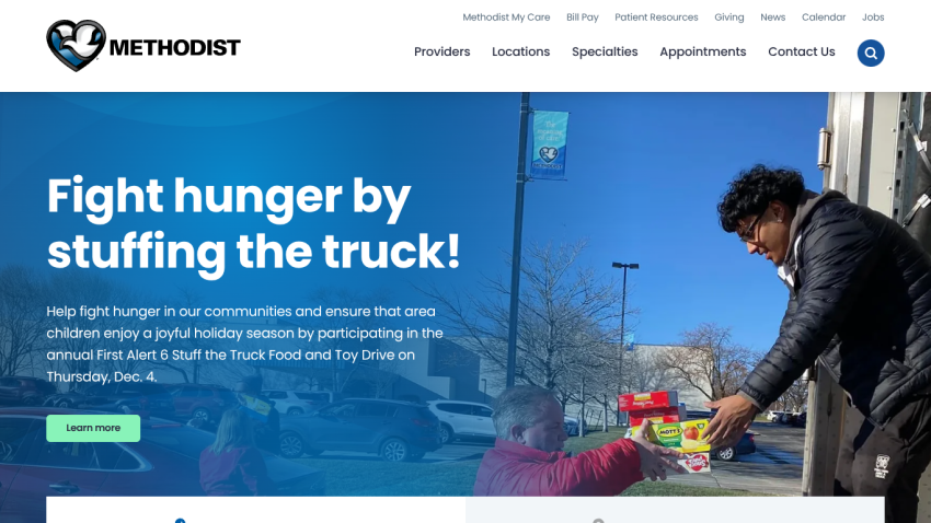Website hero section promoting a food truck to fight hunger with a call to action to learn more