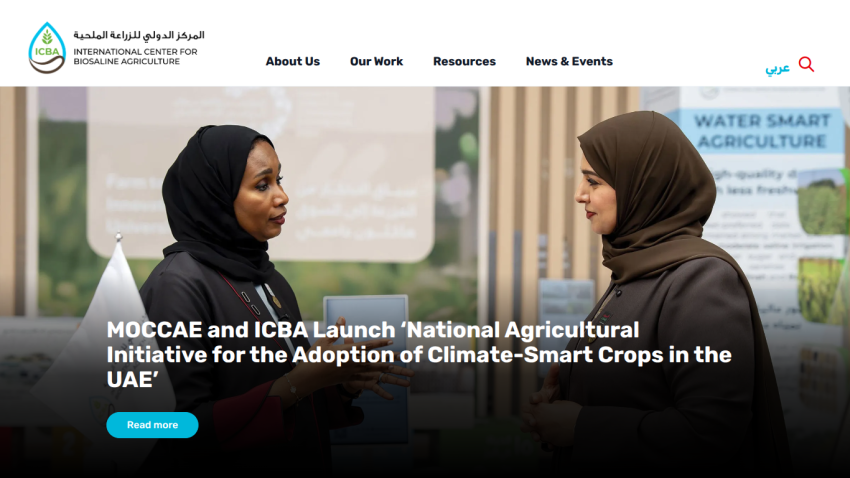 Two women discussing the launch of a climate-smart agriculture initiative in the UAE.