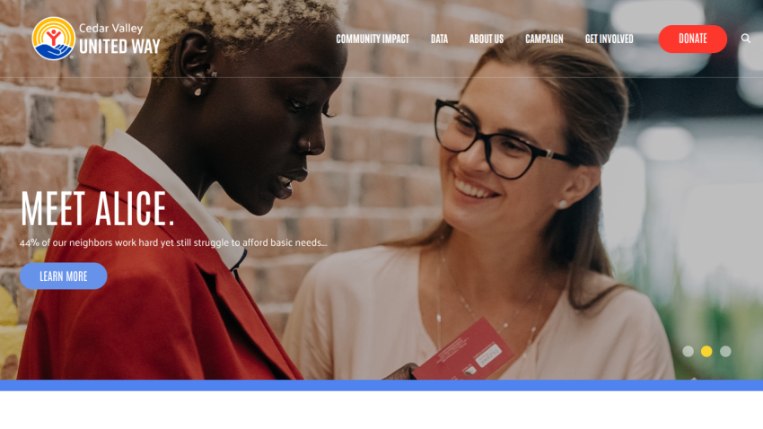 Homepage with navigation bar, large hero image of a mountain landscape, and headline 'Explore the world with us'