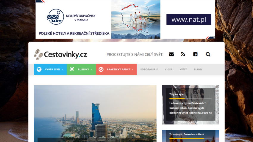 Travel website Cestovinky.cz with navigation and a city skyline hero image, featuring travel tips and guides