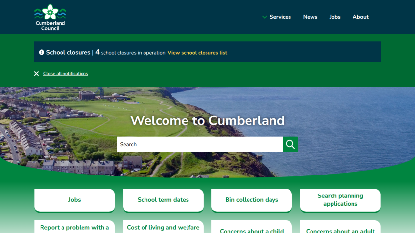 Cumberland Council homepage with search bar, school closures notice, and quick links for jobs, school dates, bin collection, and planning applications