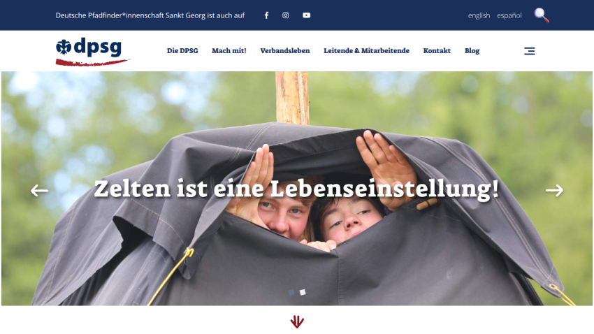 DPSG website header with navigation and hero image showing two people in a tent with text 'Zelten ist eine Lebenseinstellung!'