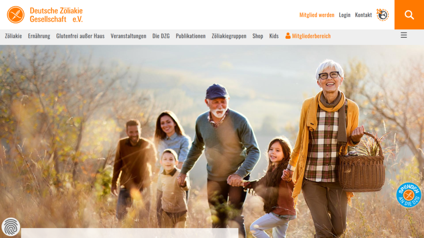 Website header and navigation of Deutsche Zöliakie Gesellschaft with a hero image of a smiling multigenerational family walking outdoors