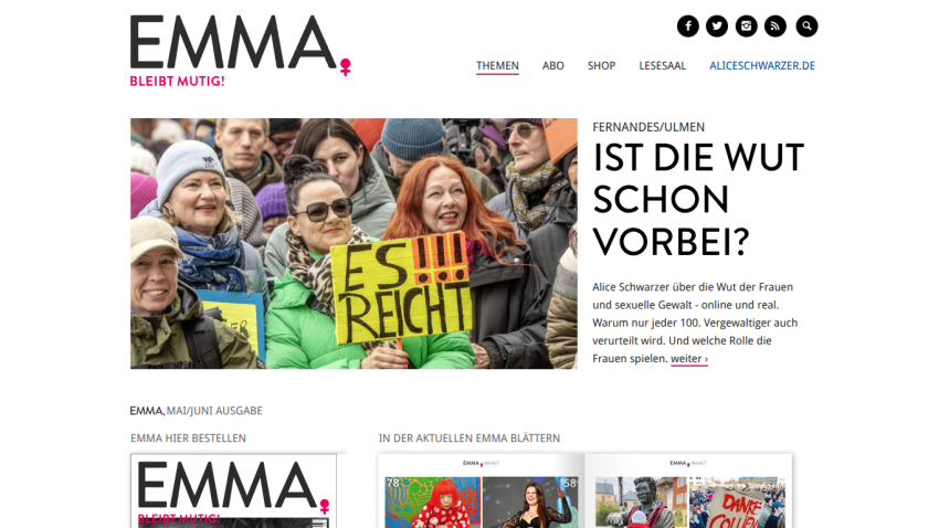 Homepage of EMMA magazine featuring a headline about women's rights and a group of women holding signs.