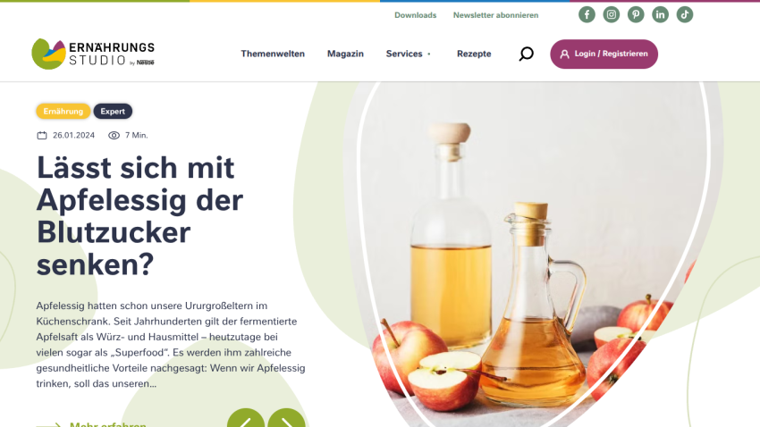 Article about whether apple cider vinegar can lower blood sugar, with bottles of vinegar and apples shown