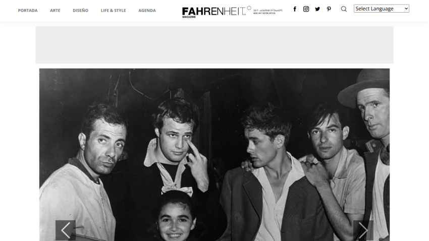 Fahrenheit Magazine homepage with navigation menu and a black-and-white photo of six people in the hero section