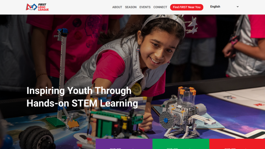 Youth engaged in hands-on STEM learning with robotics at an inspiring educational event