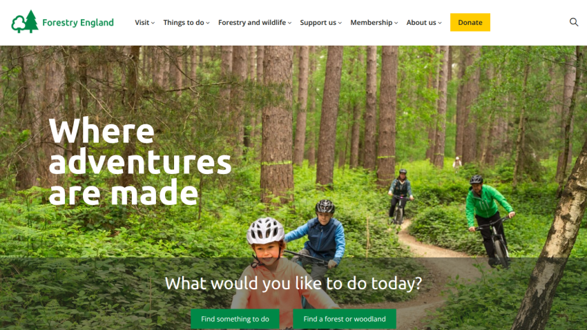 Homepage of Forestry England featuring cyclists in a forest with a prompt for activities.