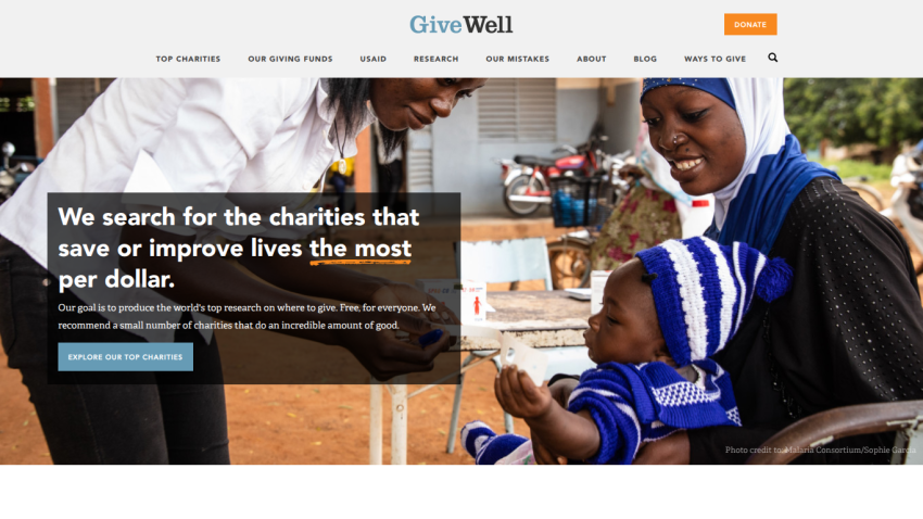 Homepage of GiveWell featuring a woman with a child and a mission statement about charity effectiveness.