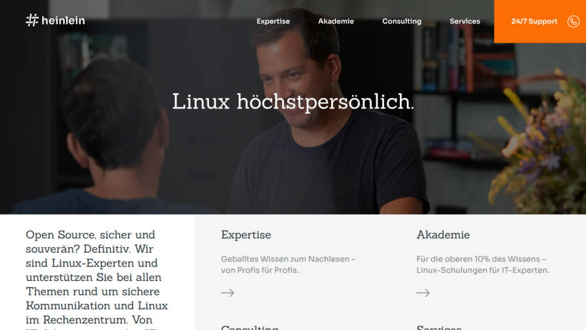 Homepage featuring a man discussing Linux, with navigation and service sections below.