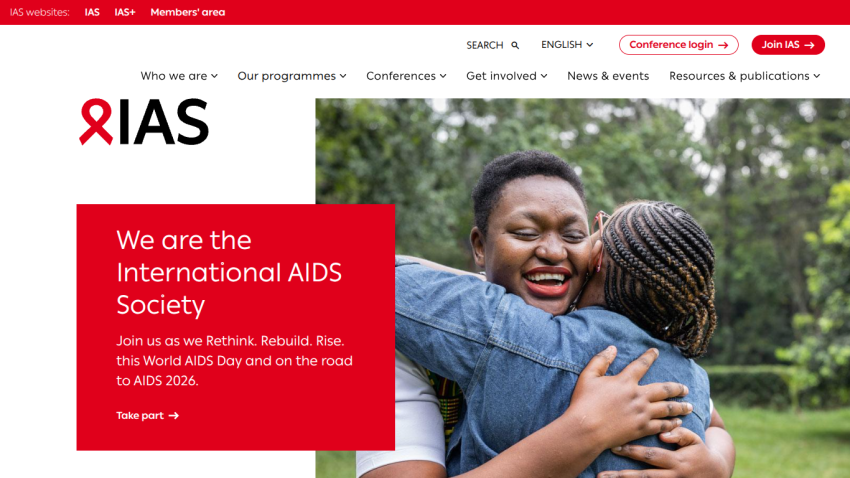 International AIDS Society homepage with headline about AIDS Day and image of two people hugging
