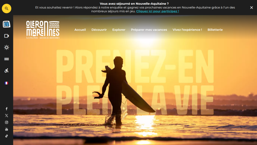 Tourism website header with navigation and a surfer walking in the ocean at sunset with text 'PRENEZ-EN PLEIN LA VIE'