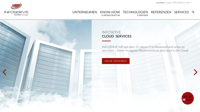 Corporate website homepage with navigation bar, skyscraper background, and cloud services promotion
