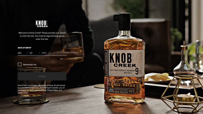 Knob Creek whiskey product page with bottle image, headline, and call to action to explore products