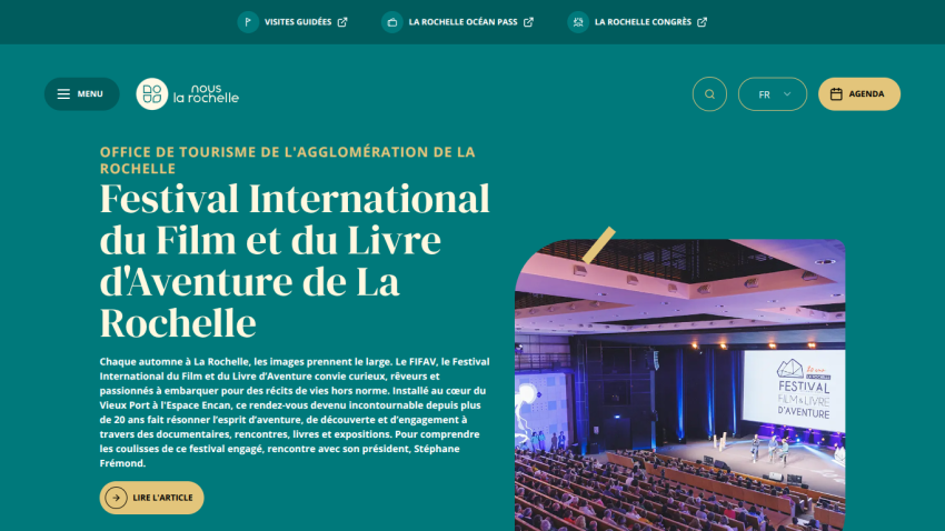 Festival International du Film et du Livre d'Aventure de La Rochelle event details with a photo of a conference hall and audience