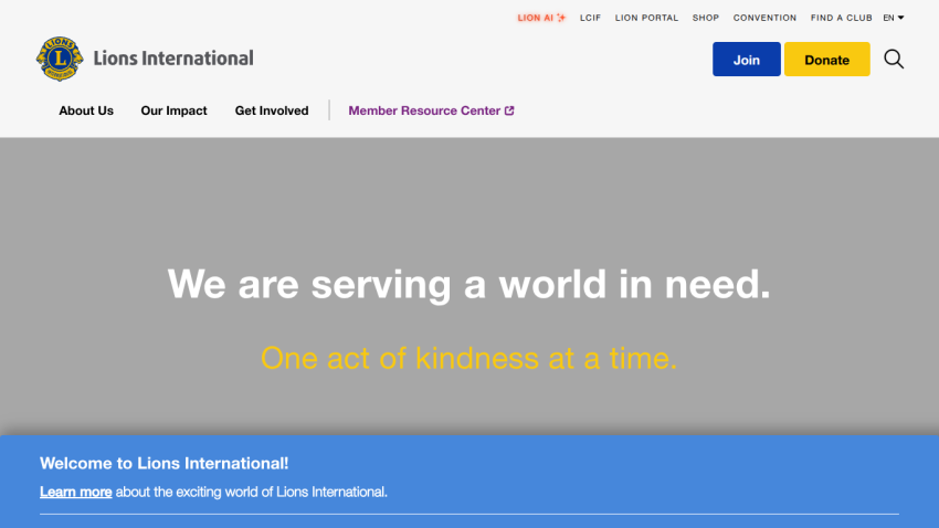 Homepage of a travel website featuring a scenic mountain landscape and navigation menu with options like Destinations and Deals
