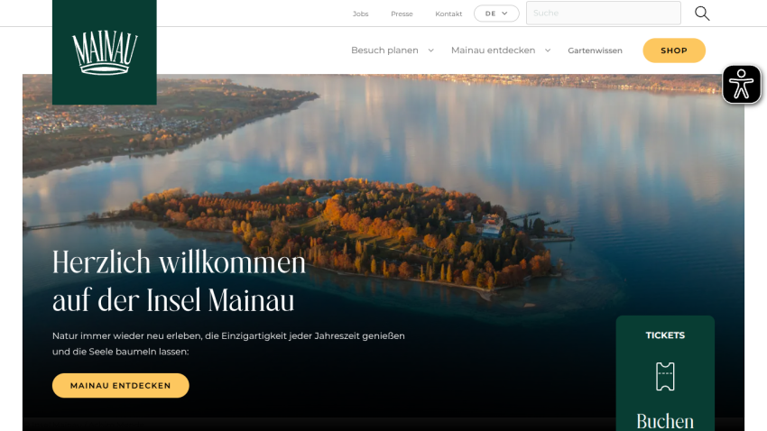 Welcome message on Insel Mainau website with aerial view of island and options to book tickets