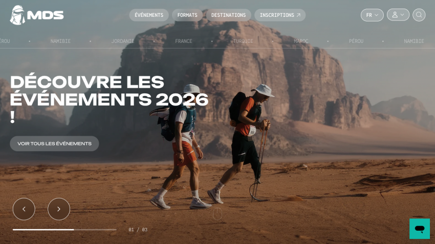 Website promoting 2026 events with navigation menu and hikers in desert landscape background