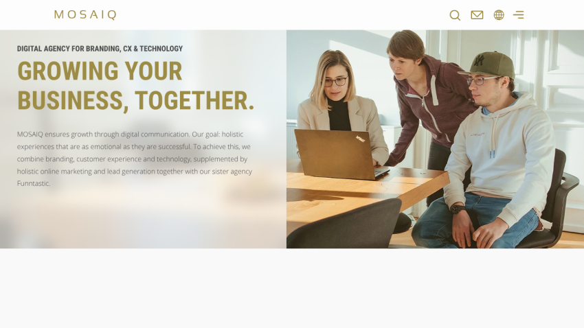 Digital agency homepage with headline 'Growing your business, together' and team collaborating around a laptop